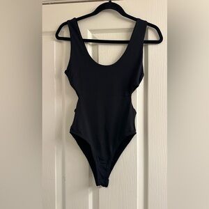Black bodysuit with cuts on the sides